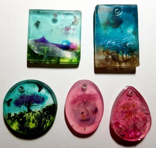 Mary G. Resin craft, pendants.